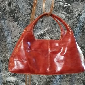 Dark red faux leather handbag, by Cato